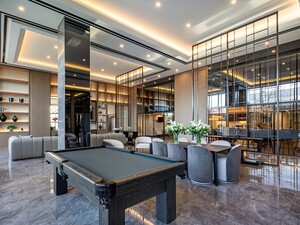 Westpark rental condos multifunctional room with pool table and couches