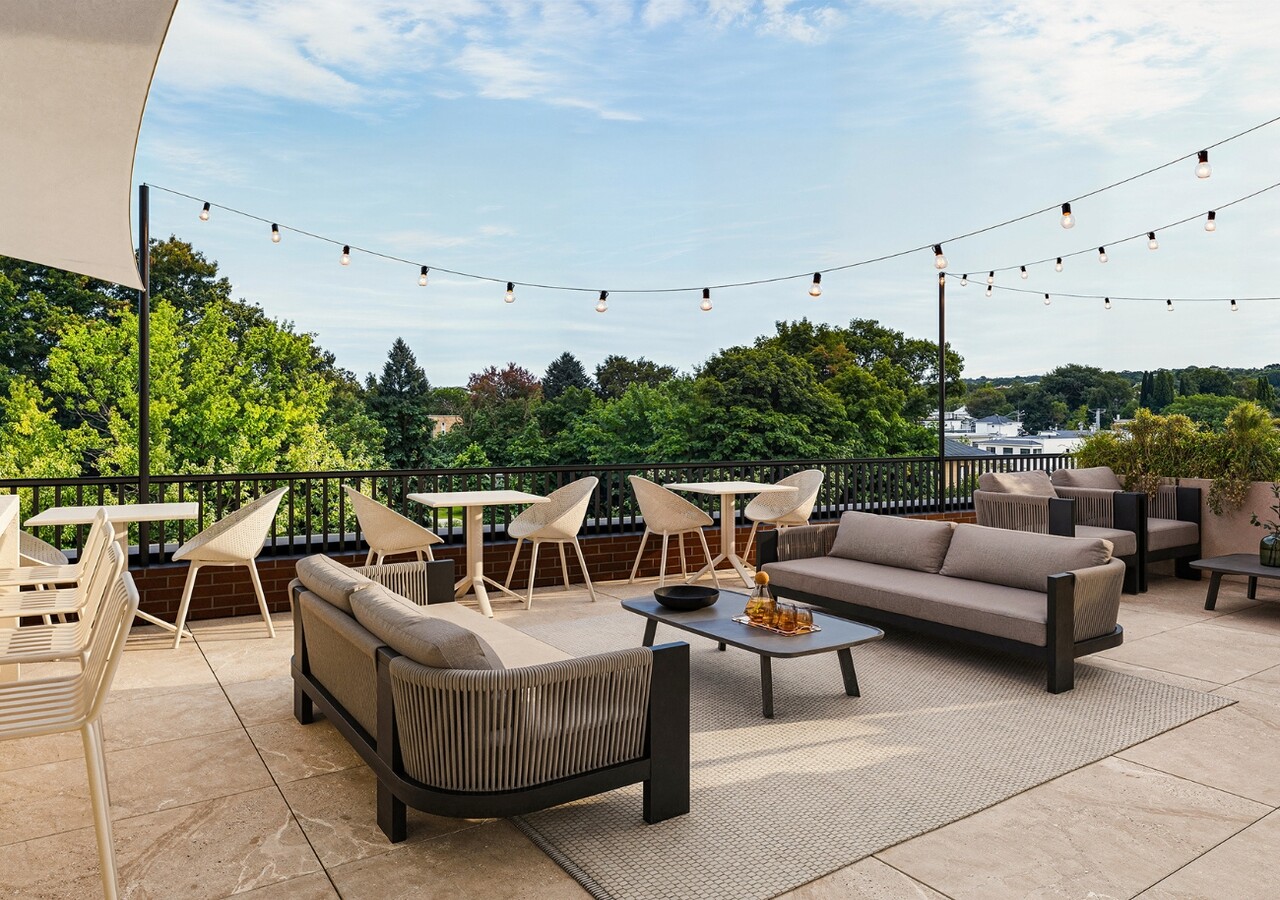 Le Miner Fernand-Trudeau Terrace with lounge areas and BBQs 