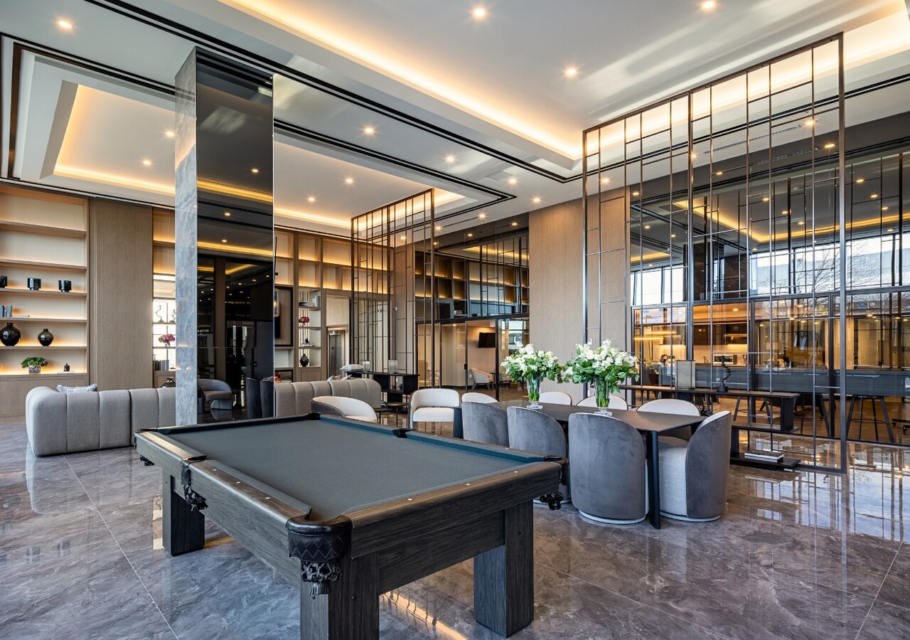 Westpark rental condos multifunctional room with pool table and couches